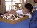 6-year-old Liao Xingwen defeats top program at Go