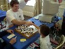 6-year-old Liao Xingwen defeats top program at Go